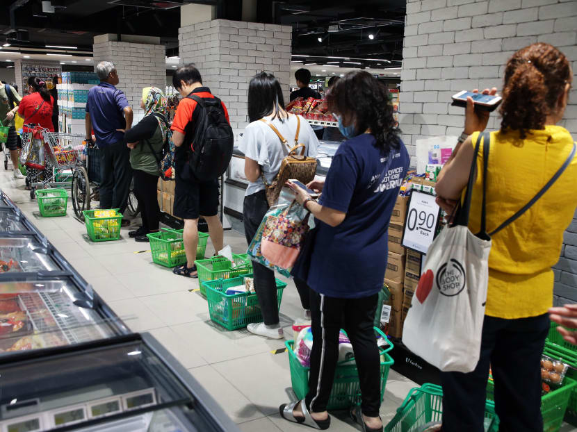 A queue at the NTUC FairPrice outlet in Woodlands Civic Centre at about 6.30pm on April 3, 2020. A queue at the NTUC FairPrice outlet in Woodlands Civic Centre at about 6.30pm on April 3, 2020.