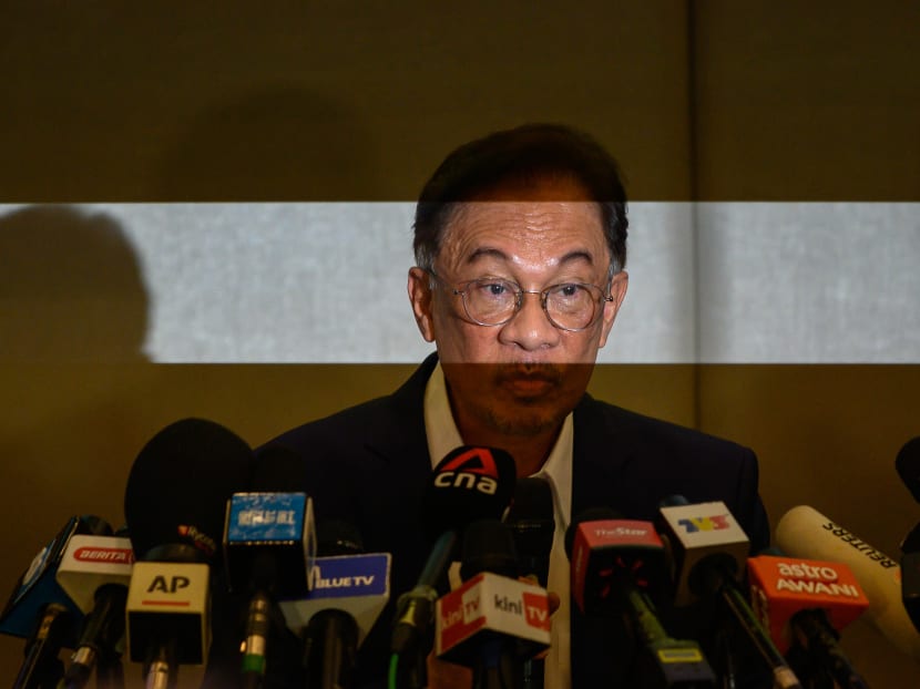 Malaysian opposition leader Anwar Ibrahim addresses a press conference at a hotel in Kuala Lumpur, Malaysia.