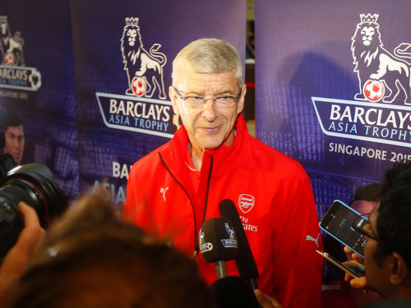 Arsenal boss Arsene Wenger (picture) insists that Mesut Ozil will remain a Gunners player. Photo: Ernest Chua