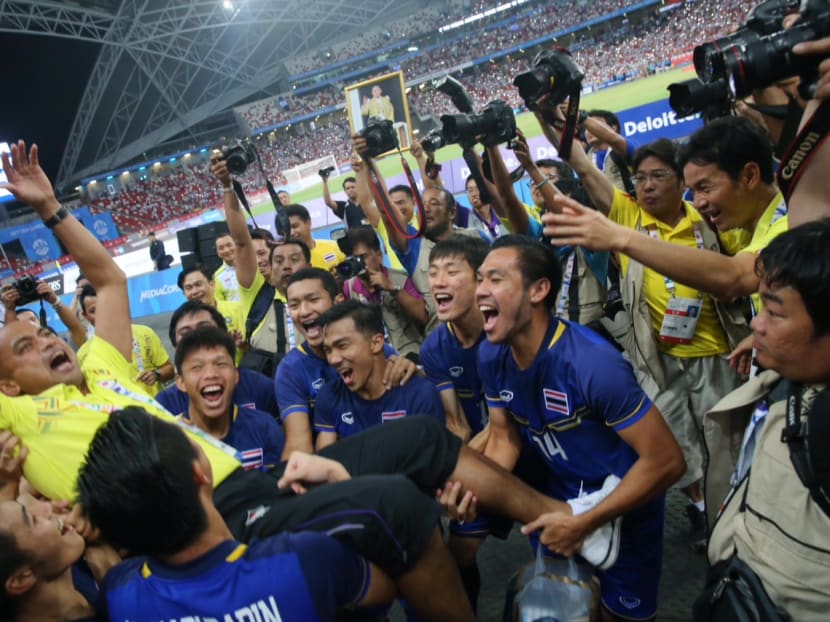 Thailand celebrating their SEA Games football Gold medal victory against Myanmar at the National Stadium. Photo: Don Wong/TODAY