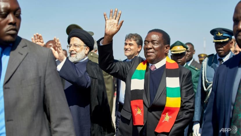 Iran's Raisi visits fellow outlier Zimbabwe ahead of key vote