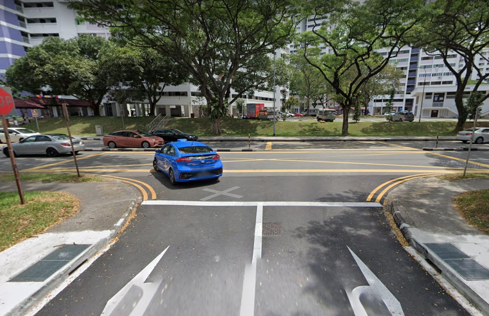 A view of an uncontrolled T-junction at the car park exit of Block 537, Jurong West Avenue 1, where a van that Muhammad Adham Ishak was driving collided with a cyclist.