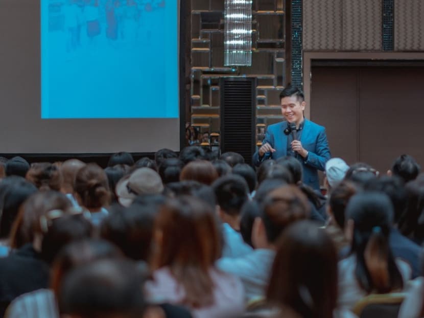 The author is seen here speaking in Hong Kong in 2019 to more than 400 financial consultants from a global insurance corporation on using social media to build their professional branding.