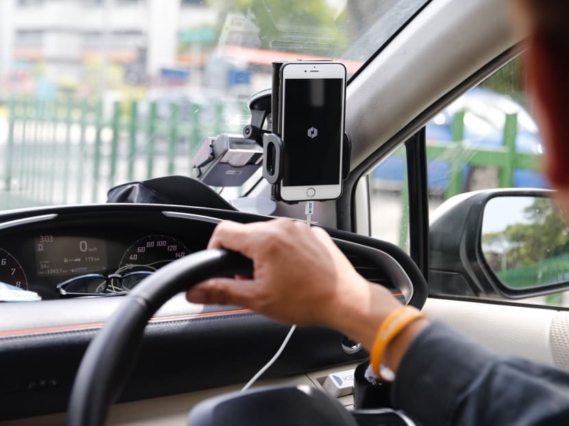 They may have to fork out extra money for being late, but users of Uber’s ride-hailing service are largely unperturbed by the company’s new “wait-time” fee, which they felt is only fair to the drivers. Photo: Najeer Yusof/TODAY