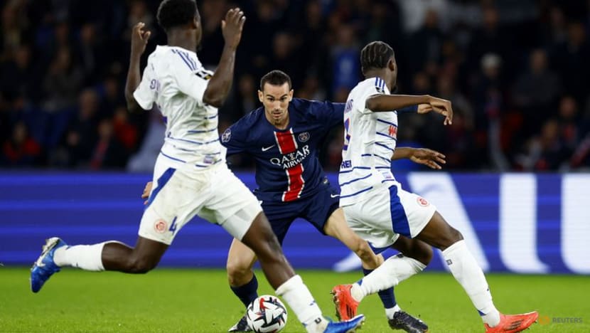 PSG beat Strasbourg 4-2 to claim top spot