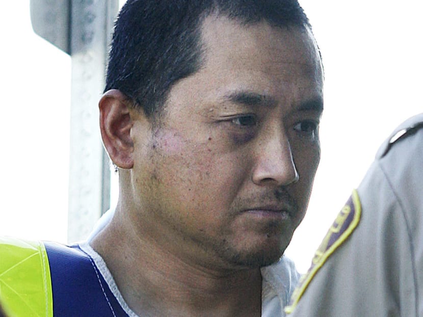 Vince Weiguang  Li, accused of stabbing, beheading and cannibalizing another man on a Greyhound bus in Canada ,is brought to a Portage La Prairie court Tuesday, August 5, 2008 and was ordered by the judge to undergo a psychiatric assessment. Photo: AP