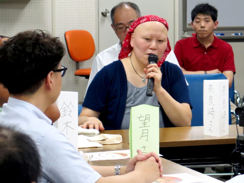 Ms Mayumi Narazaki presiding over a support group meeting for intellectually disabled individuals in the Japanese city of Yokohama. To have their voices heard, another group of Japanese with intellectual impairments have launched an Internet broadcasting station of their own. Photo: Kyodo News
