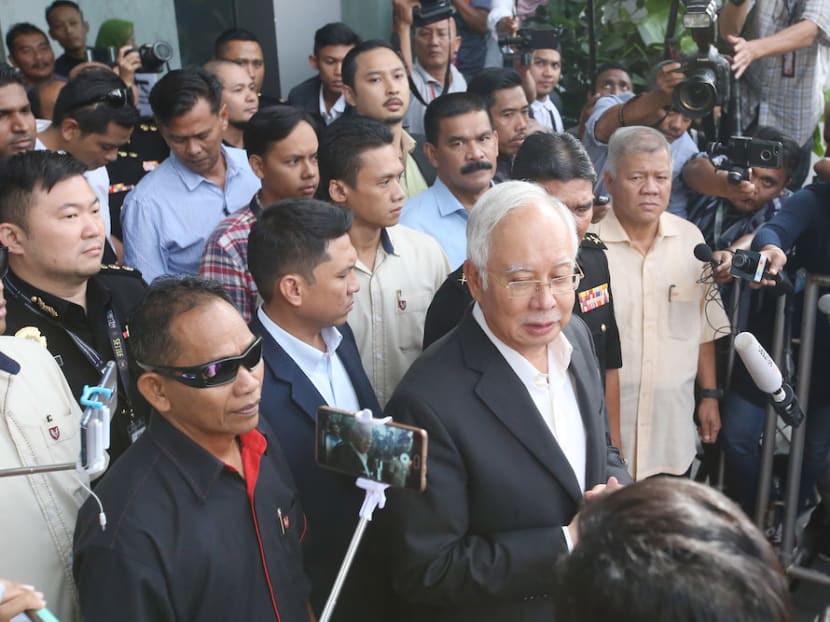 Former Malaysian prime minister Najib Razak leaves MACC headquarters in Putrajaya on May 24, 2018. Najib and former Treasury secretary-general Mohd Irwan Serigar Abdullah are expected to be charged on Thursday in connection with the 1MDB scandal.