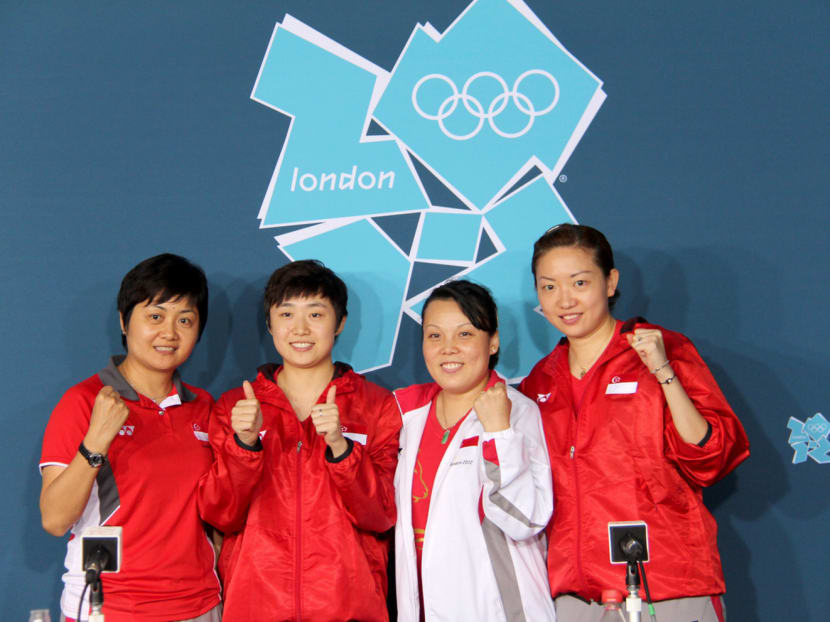 From left: Singapore national table tennis women's team assistant coach Jing Junhong, Feng Tianwei, Wang Yuegu and Li Jiawei after their 3-0 win over South Korea to claim the bronze medal at the London Olympics. Photo: Tan Yo-Hinn