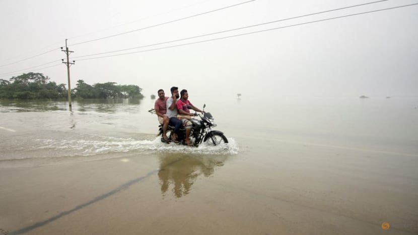 Floods swamp more of Bangladesh and India, millions marooned Floods swamp more of Bangladesh and India, millions marooned