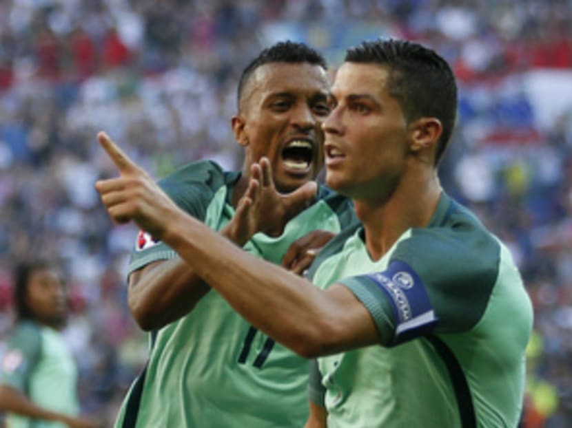 Ronaldo (right) scored a double in the thrilling 3-3 draw with Hungary. His team-mates will be hoping for a repeat performance from him when they face Croatia. Photo: Reuters