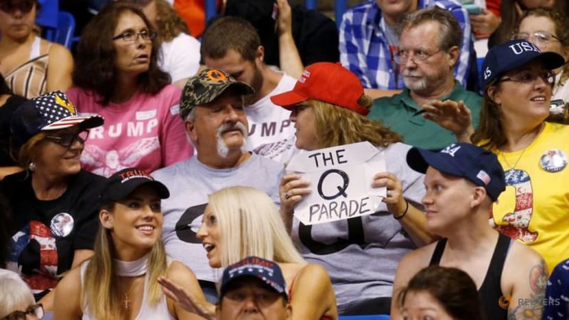 Facebook removes hundreds of QAnon groups, citing public safety risks Facebook removes hundreds of QAnon groups, citing public safety risks