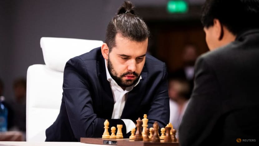 Chess-Carlsen blows Nepomniachtchi away to claim fifth world title Chess-Carlsen blows Nepomniachtchi away to claim fifth world title
