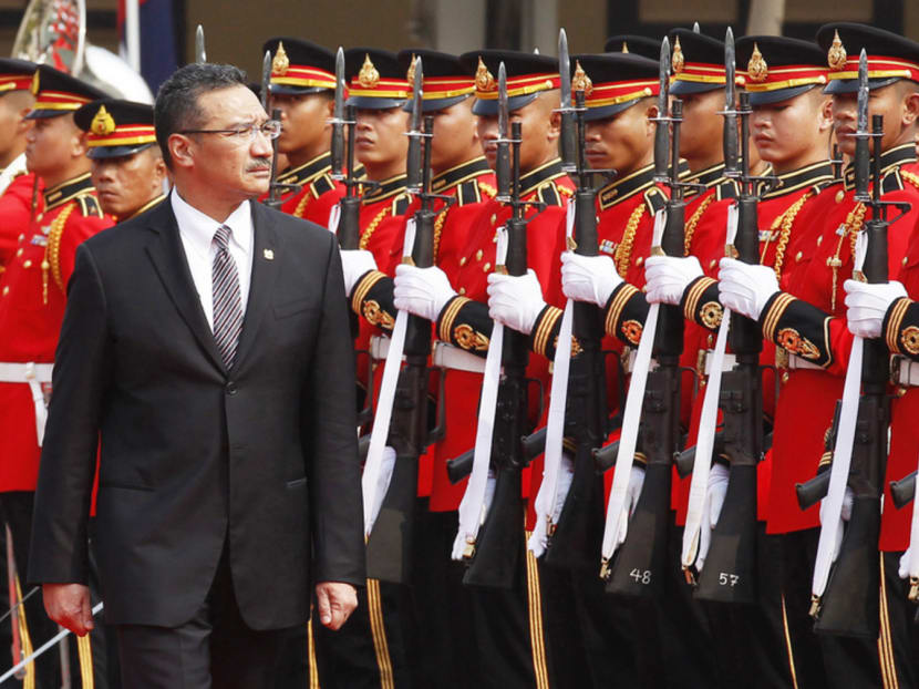 Mr Hishammuddin Hussein reviewing Thailand’s guard of honour during his visit to Bangkok in January. Nearly one in five in the survey wanted Mr Hishammuddin to lead UMNO after its leaders retire. Photo: Reuters