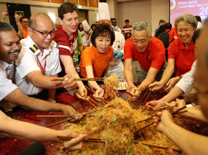 Prime Minister Lee Hsien Loong and his wife Ho Ching during a visit to SATS on the first day of the Chinese New Year on Feb 5, 2019.