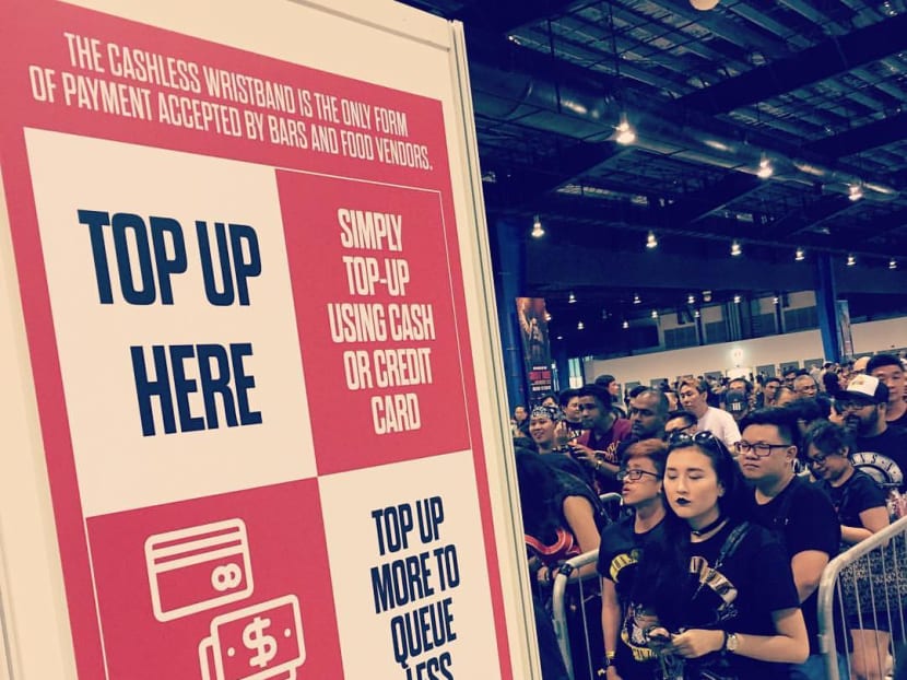 Those eligible for refunds would have topped up their RFID wristbands via Sandpiper Digital Payments Asia booths at the Changi Exhibition Centre. Sandpiper was the company behind the wristbands and the payments systems at the GUns N' Roses concert. Photo: LAMC Productions/Facebook