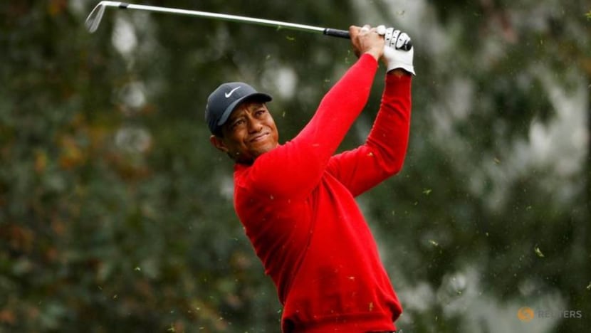 Golf-Woods says rehab from car crash 'painful', focuses on walking on his own