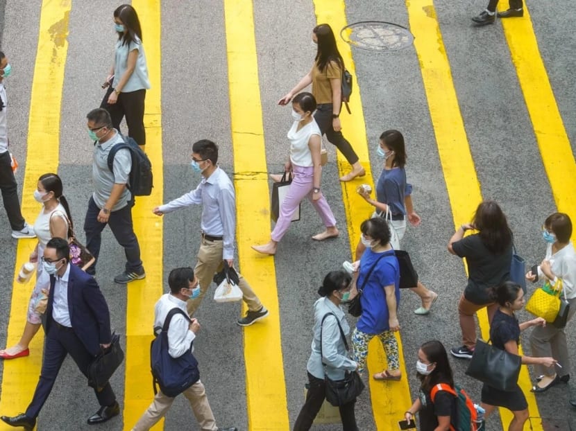 The triple-digit infection tally comes a day after the Hong Kong administration announced it would make mask-wearing mandatory in indoor public spaces, while civil servants would once again begin working from home.