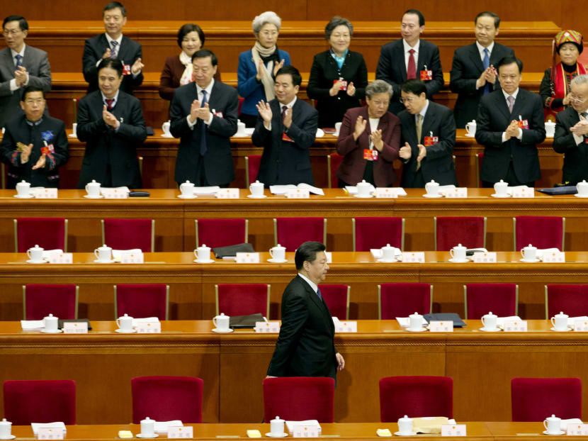 Chinese President Xi Jinping arriving for the opening session of the annual National People’s Congress in Beijing on March 5 last year. Political watchers will continue to read tea leaves on the rising political stars who could make it into the Politburo Standing Committee. PHOTO: AP