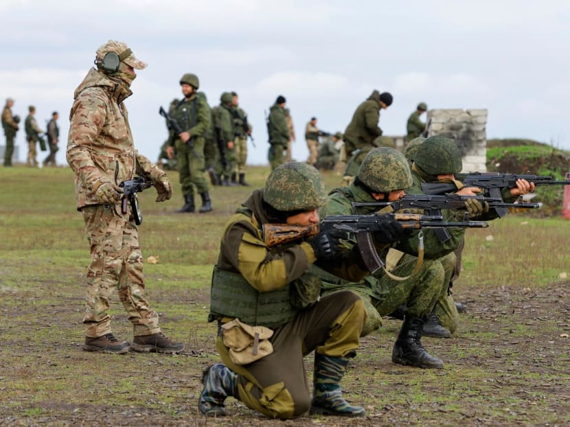 An instructor trains Russian newly-mobilised reservists at a shooting range in the course of Russia-Ukraine conflict in the Donetsk region, Russian-controlled Ukraine, on Oct 10, 2022.