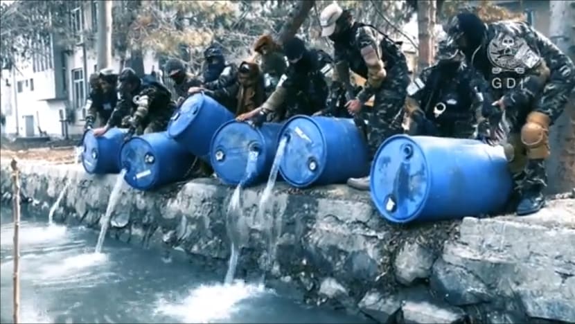 Afghan agents pour 3,000 litres of liquor into Kabul canal