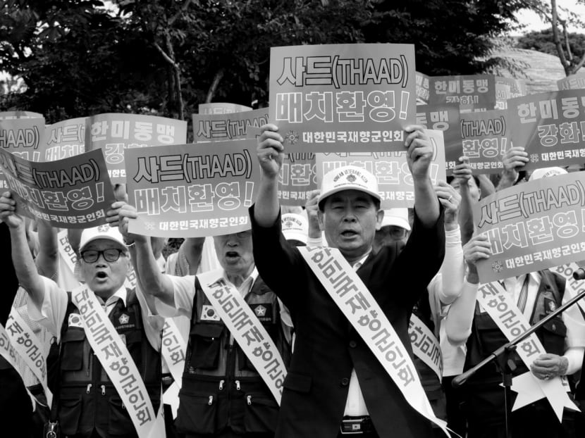Members of the Korean Veterans Association at a rally 

in front of the Defense Ministry in Seoul to support the deployment of the Terminal High-Altitude Area Defense (Thaad) system. South Korea’s foreign policy decisions — like its choice to allow the Thaad deployment — also impact its diplomatic standing and middle-power status. Photo: AP