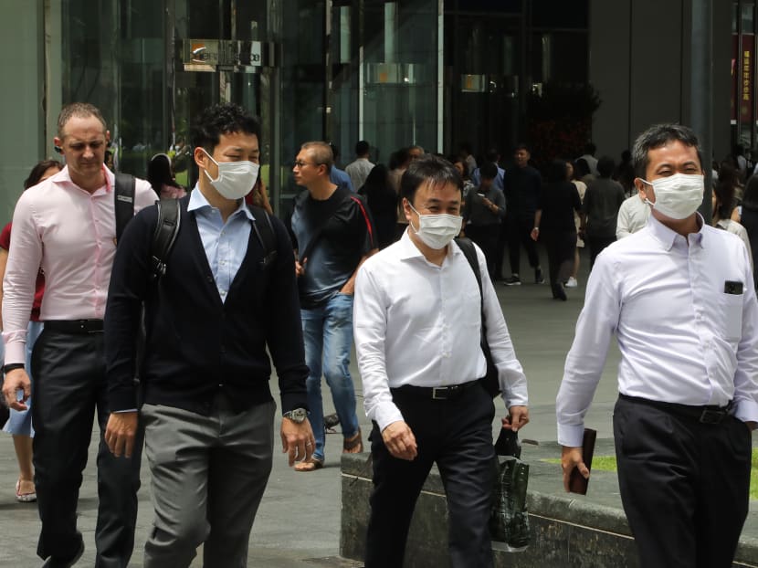 Office workers in the Central Business District on Feb 4, 2020.