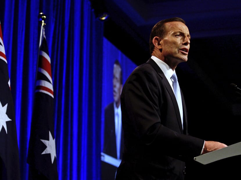 Australia's Prime Minister-elect Tony Abbott speaks to supporters in Sydney, on Sept 7, 2013, following his win in Australia's national election.  Photo: AP