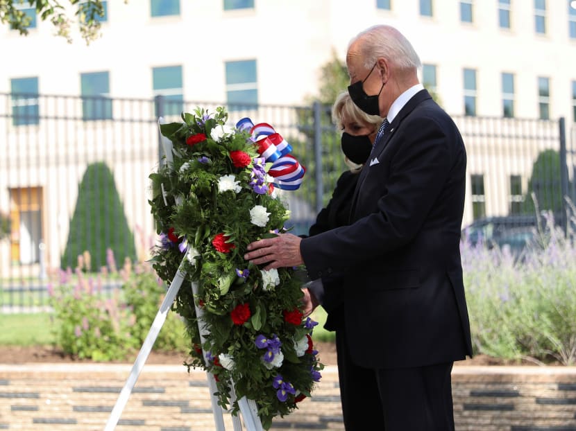 US President Joe Biden and first lady Jill Biden lay a wreath at the Pentagon on the 20th anniversary of the Sept 11, 2001 attacks in Arlington, Virginia, US, on Sept 11, 2021.
