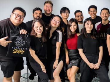 Co-founders Richard Xia (extreme left) and Chris Yue (extreme right) with members of the Novelship team. Photo: Novelship