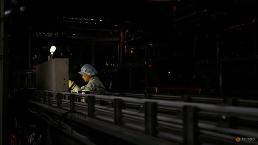 Japan factory activity slips back into contraction in June on soft orders