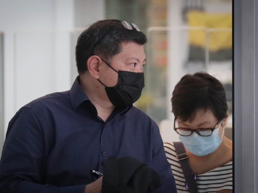 Public servant Chua Wee Lin (front) was charged under the Official Secrets Act for allegedly sharing classified information about Singapore’s economic reopening during the Covid-19 pandemic in 2021.