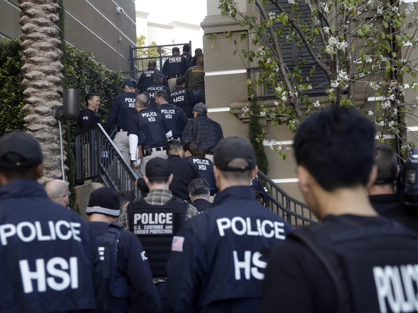 Federal agents swarmed the complex in the Orange County where authorities say a birth tourism business charged pregnant women US$50,000 for lodging, food and transportation. Photo: AP