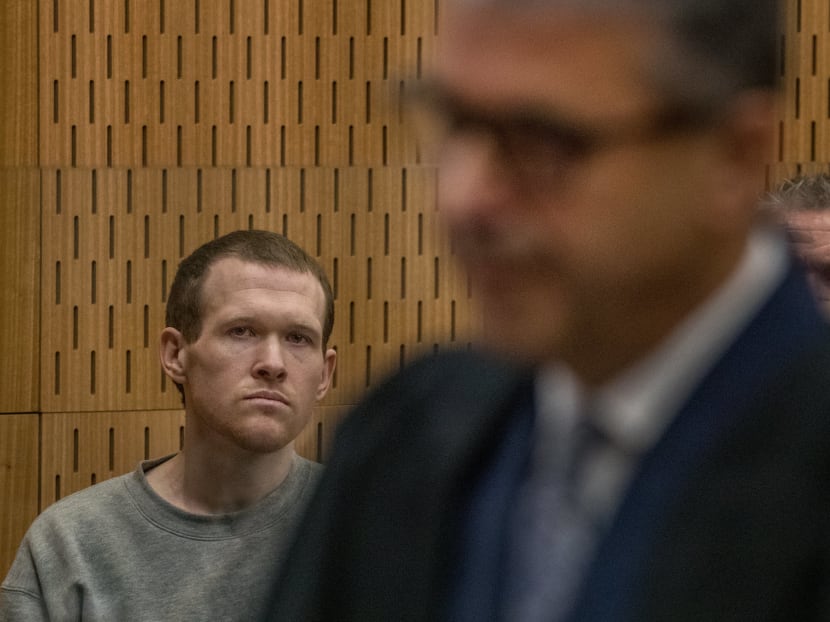 Australian white supremacist Brenton Tarrant (left) listens as Crown prosecutor Mark Zarifeh delivers his submission in court in Christchurch on Aug 27, 2020.