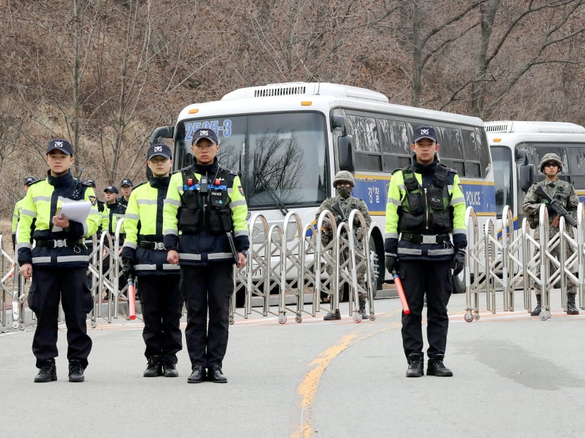 Police officers and soldiers in South Korea on Wednesday guarding the site where Thaad is set to be deployed. China responded with anger when Seoul agreed in July to accept the US missile defence system, and it has made its displeasure known as plans have moved toward the final stages in recent days. Photo: Reuters