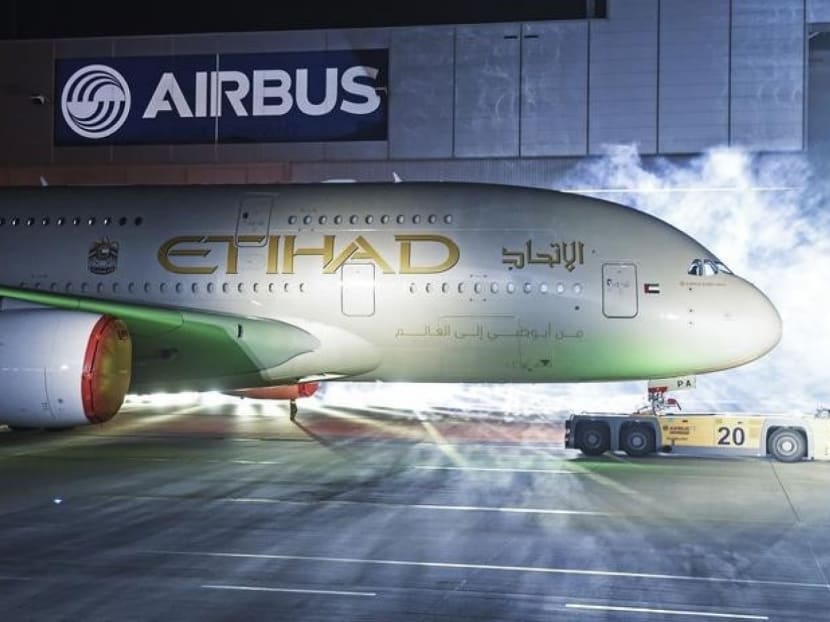 An Airbus A380 rolls out of a paint hangar during a branding ceremony of Etihad Airways at the German headquarters of aircraft company Airbus, in Hamburg-Finkenwerder. Photo: Reuters