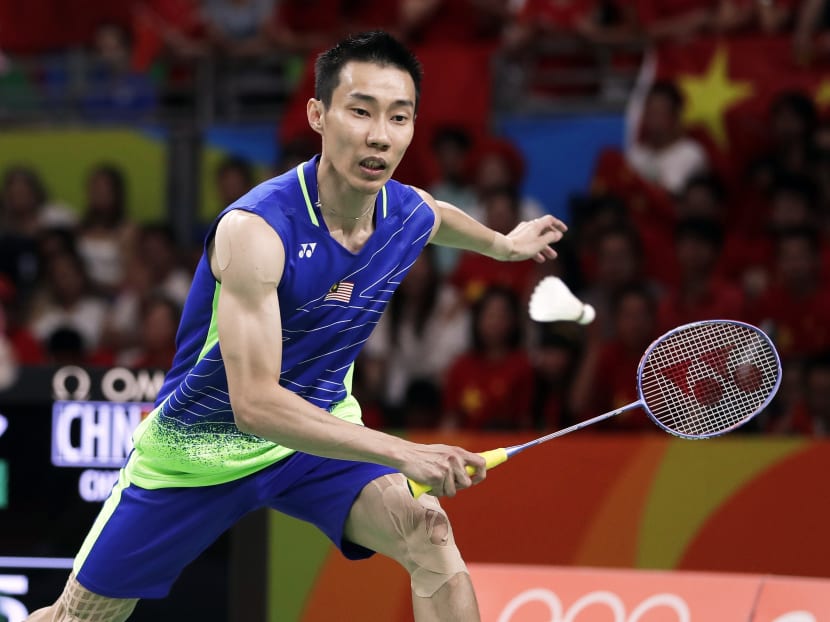 Malaysia's Lee Chong Wei returns a shot to China's Chen Long during the men's badminton singles gold medal match at the 2016 Summer Olympics in Rio de Janeiro, Brazil, on Aug 20, 2016. Photo: AP
