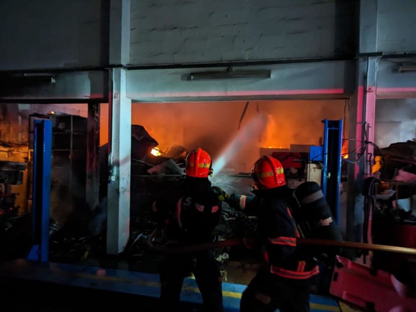 Firefighters trying to contain a blaze at a workshop on Defu Lane on Nov 25, 2022.