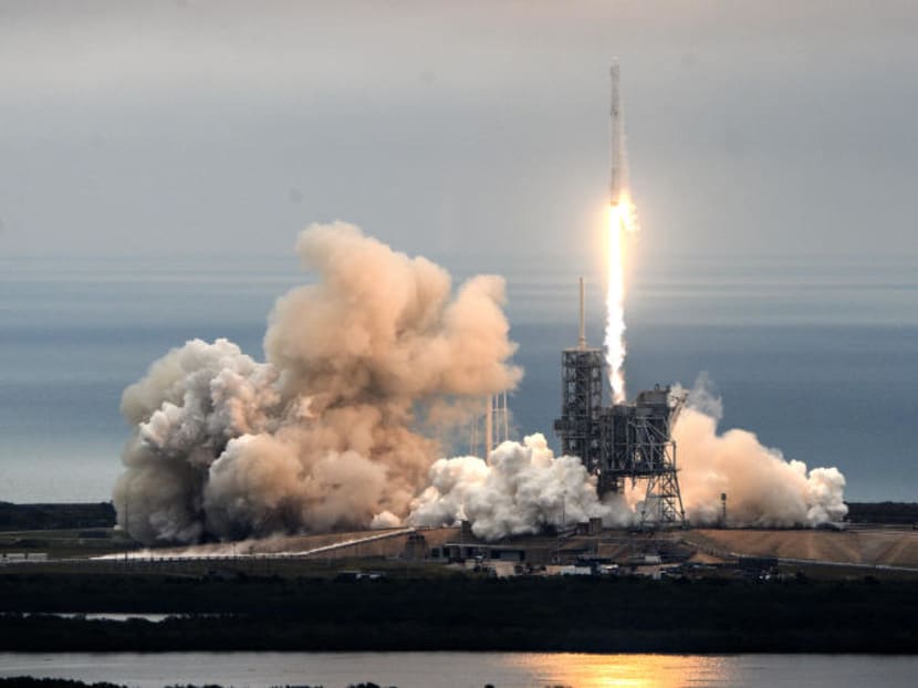 A SpaceX Falcon 9 rocket lifting off. Photo: AP