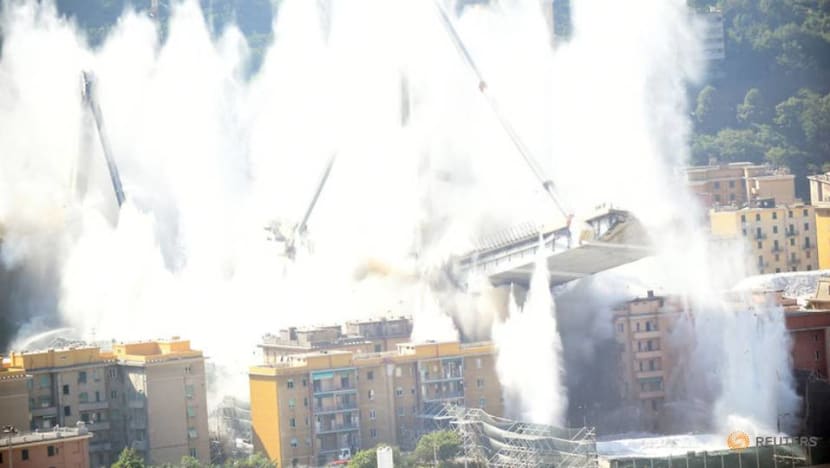Controlled explosions demolish remains of collapsed Italy bridge Controlled explosions demolish remains of collapsed Italy bridge