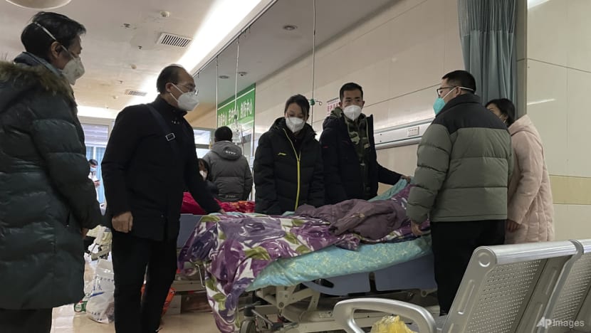 Packed ICUs, crowded crematoriums: COVID-19 roils Chinese towns