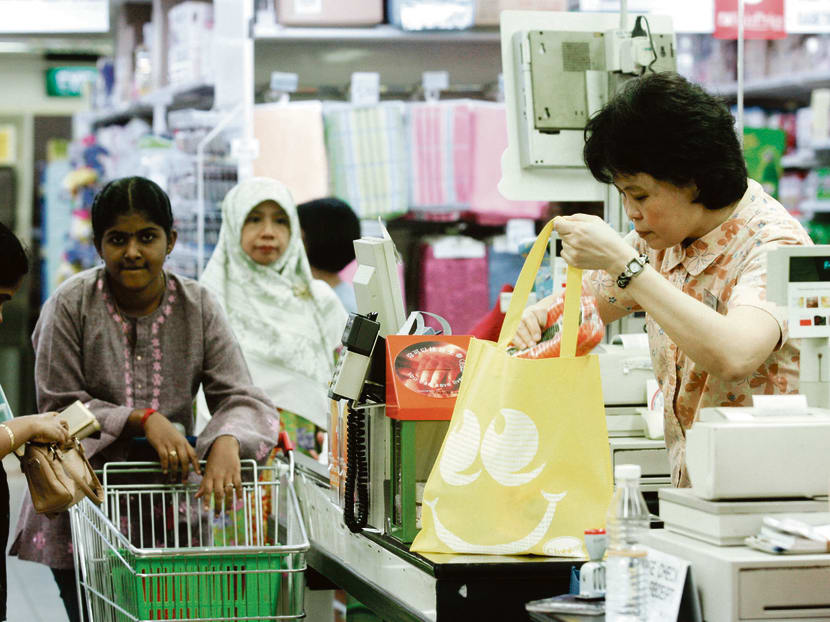 FairPrice encourages their shoppers and the community at large to use cashless payments. TODAY file photo
