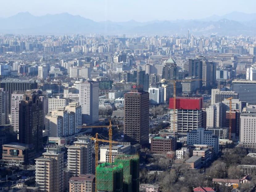 China new home prices down less in Dec on promotions, easing curbs China new home prices down less in Dec on promotions, easing curbs
