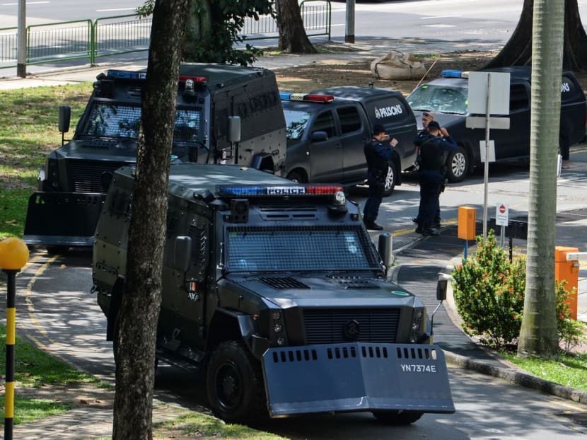 A file photo of a motorcade of armoured police vehicles outside the State Courts, transporting suspects who were prosecuted under the anti-terror law.