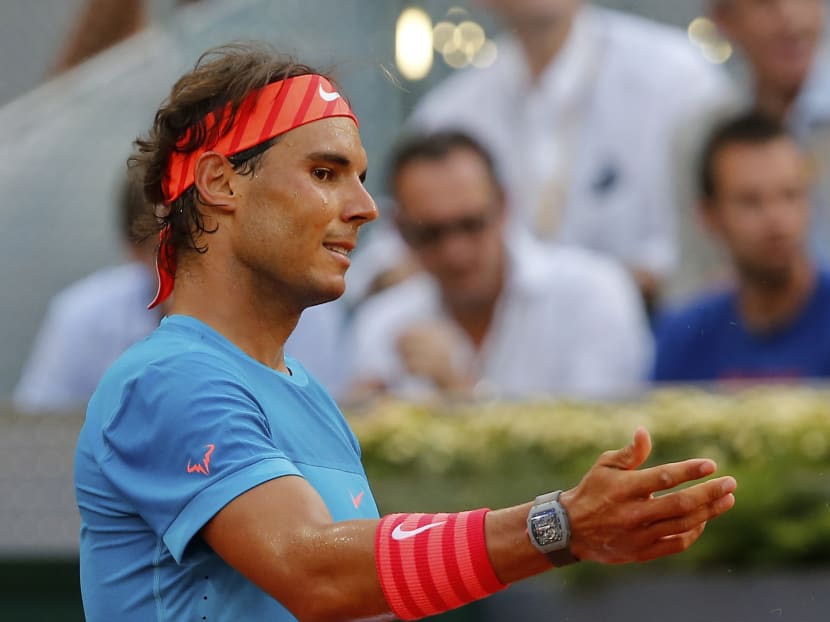 Rafael Nadal of Spain gestures during the men's singles final match against Andy Murray of Britain at the Madrid Open Tennis tournament in Madrid, Spain, on May 11, 2015. Photo: AP