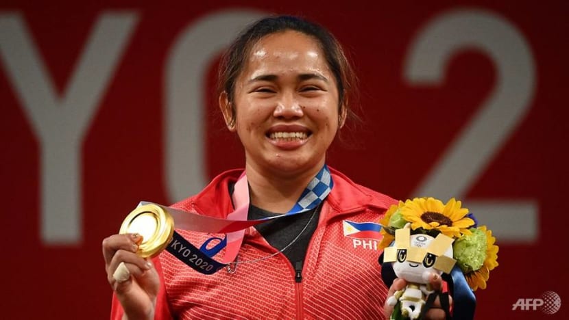 Weightlifter Diaz wins first ever Olympic gold for ...