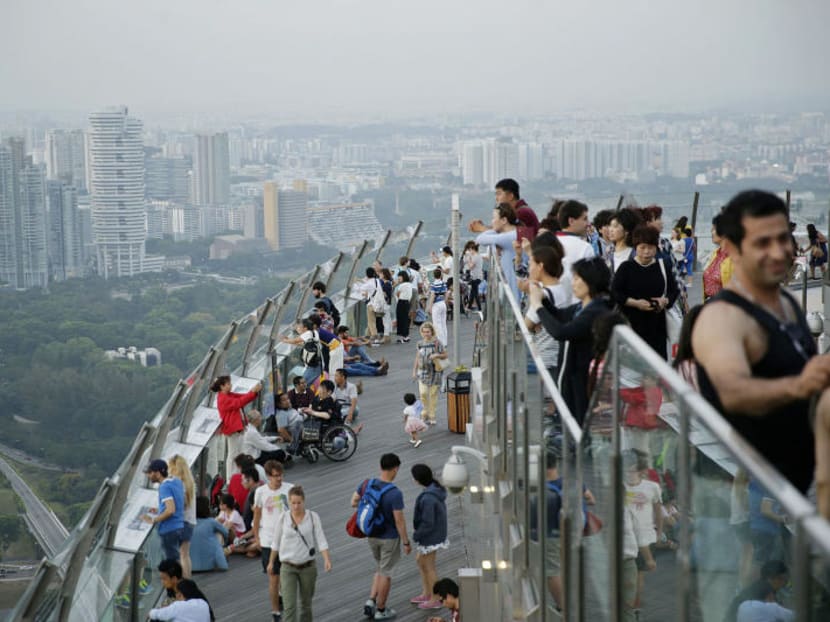 A file photo of hazy skies seen from the Marina Bay Sands Sky Park. Tourists in Singapore for Formula One night race hope for better shots of the skyline and circuit.