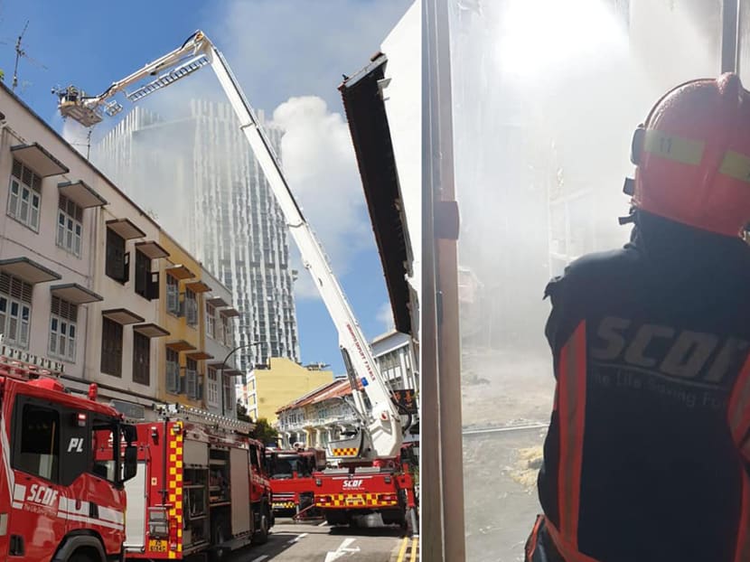 2 firefighters taken to hospital after battling fire at shophouse near Outram Park MRT Station 2 firefighters taken to hospital after battling fire at shophouse near Outram Park MRT Station