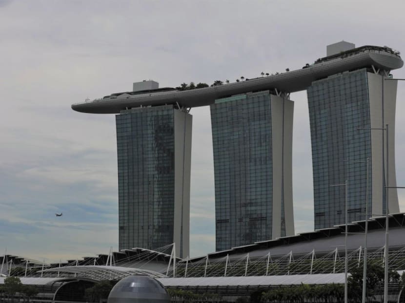 The 54-year-old man and 47-year-old woman confronted three safe distancing ambassadors at Marina Bay Sands when they were advised to wear their masks properly.