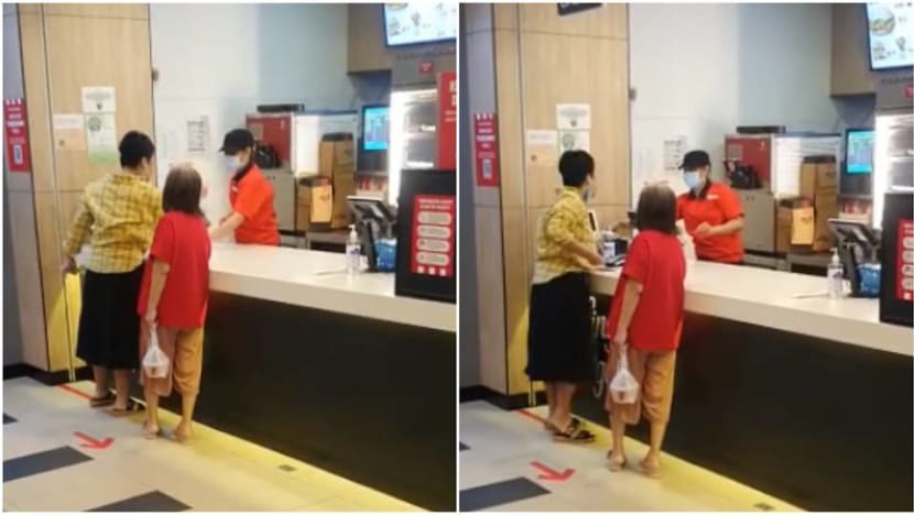 Woman charged over KFC spitting incident, intends to claim trial